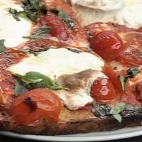 Chunky Grandma · Brooklyn style pan pizza, fresh mozzarella, topped with house marinara, cherry tomatoes, par...