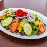 Tossed Salad · A mix of romaine lettuce, red leaf lettuce, tomatoes, Bermuda onions, kalamata olives, cucum...