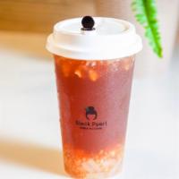 Amber Lake · Lychee passionfruit and black tea mix with lychee fruit bits and lychee jelly.