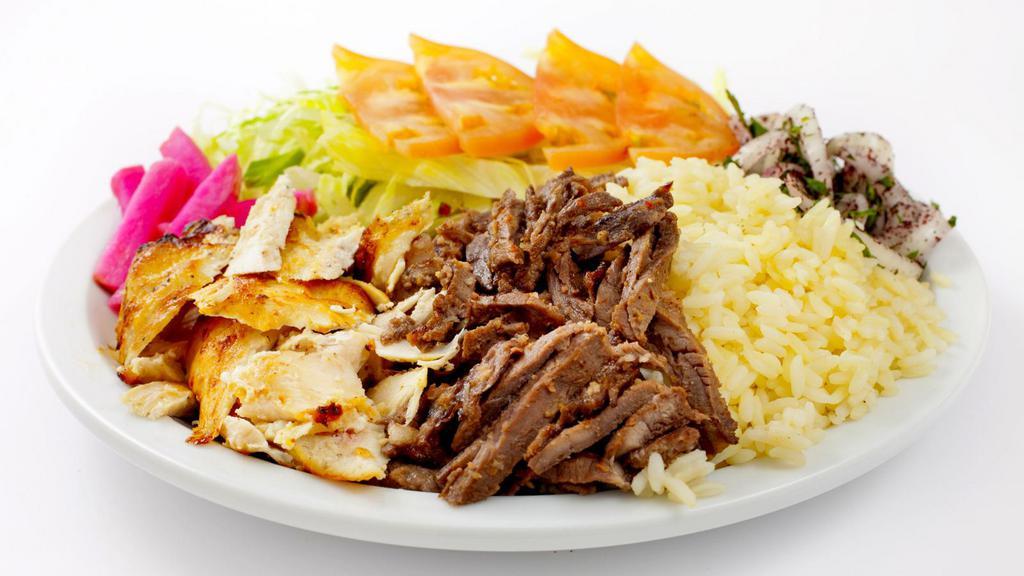 Halal Chicken & Halal Lamb Platter · Halal. Juicy halal chicken and lamb. Served over rice with a side of salad, white sauce, and spicy sauce.