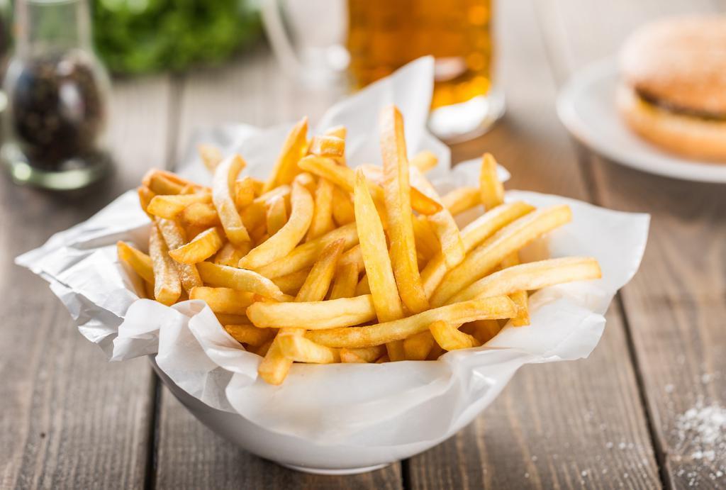 French Fries · Hearty hand cut golden french fries.