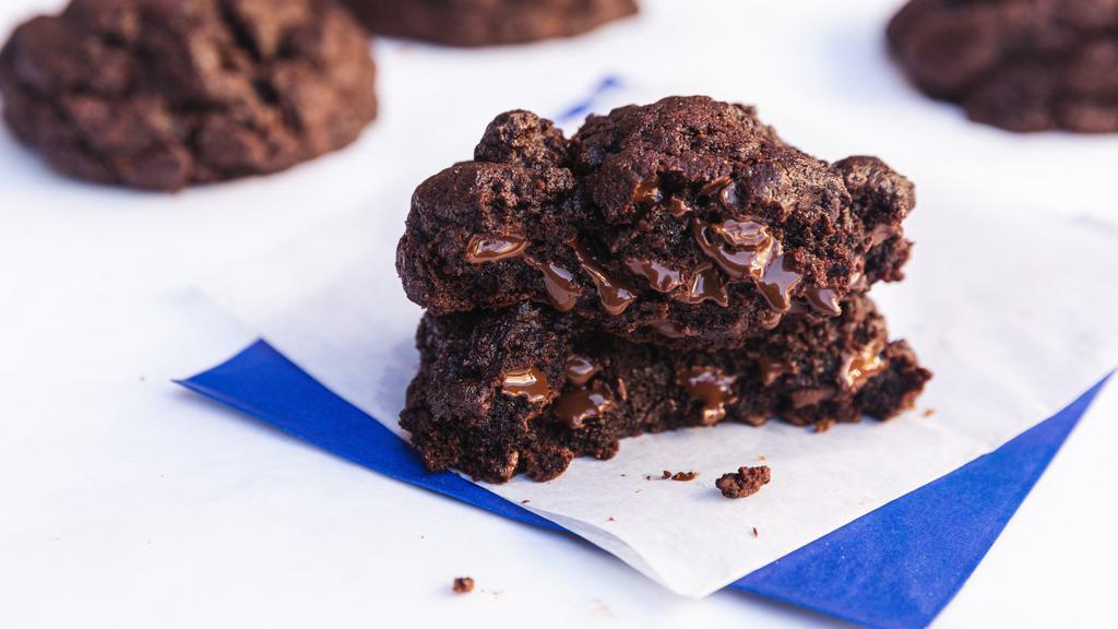 Dark Chocolate Chip Cookie · The ultimate chocolate cookie - dense, chewy, and dangerously rich. Crafted with extra dark French cocoa and semi-sweet chocolate chips, these cookies are guaranteed to satisfy even the biggest chocoholic.