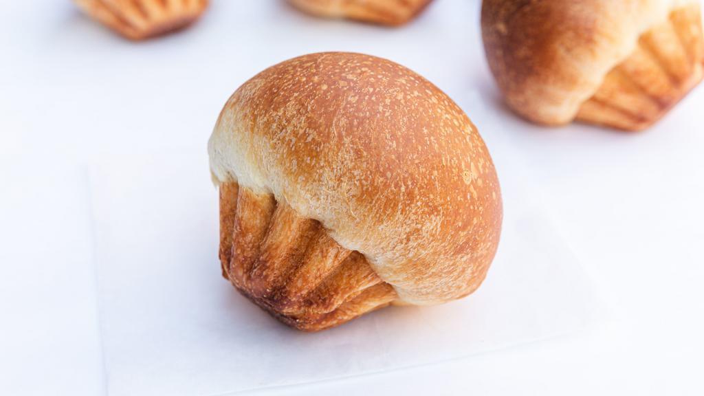 Plain Brioche · We bake this traditional French bread the way we like it - rich with butter and eggs. Simple, delicious, and perfect with coffee.