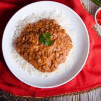 Dal Makhani · Black lentils and kidney beans with herbs and spices boiled to perfection. Served with 8 oz....