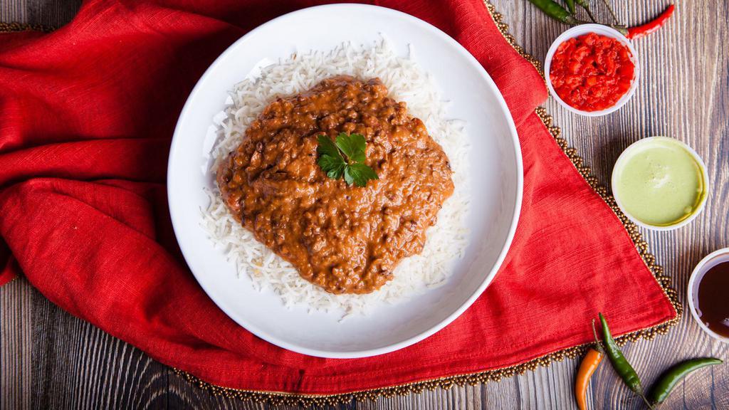 Dal Makhani · Black lentils and kidney beans with herbs and spices boiled to perfection. Served with 8 oz. of Jeera rice.