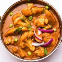 Aloo Gobi Masala · The classic! Cauliflower buds simmered with cumin seeds and roasted potatoes in light turmer...