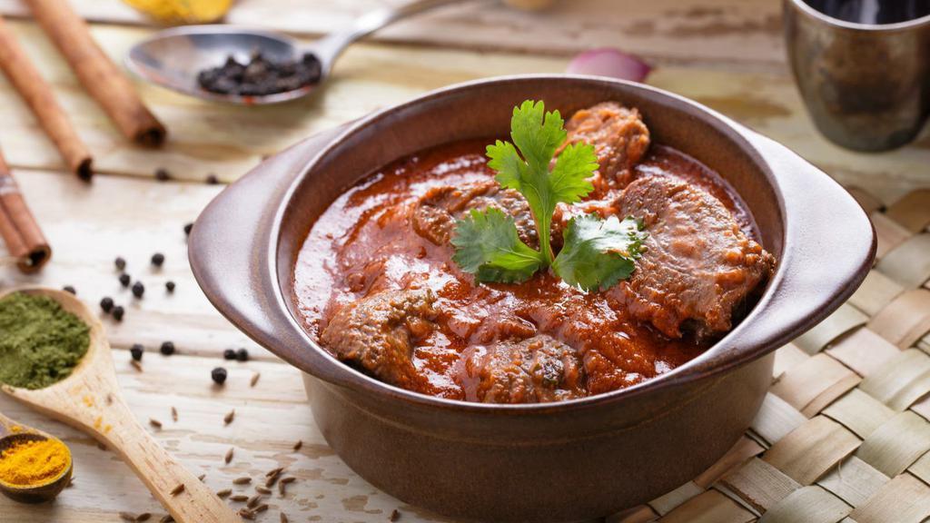 Lamb Rogan  Josh · Customer's favorite! Classic north Indian dish cooked in cardamom sauce. Served with 8 oz. of Jeera rice.