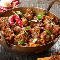 Chili Fried Lamb · Sliced lamb sautéed with onions, chopped green chilis cooked in Hakka style. Served with 8 o...