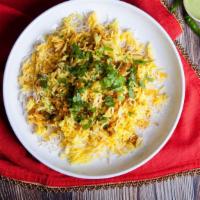 Chicken Biryani · Fresh basmati rice made with pieces of marinated chicken and various Indian herbs, spices an...