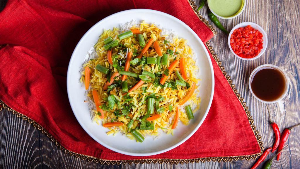 Vegetable Biryani · Fresh basmati rice made with fresh vegetables, homemade spices and dry fruit.