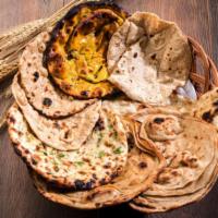 Assorted Bread Basket · An assortment of naan, roti and paratha.