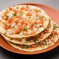 Masala Papad  · A deep-fried cracker topped with chopped onions, chillies, peppers and seasoning.