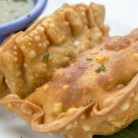 Emapanadas · Served with turnovers filled with picadillo or chicken fricassee.