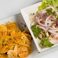 Ceviche Mixto · Include mixed seafood, lime juice and plantain chips.