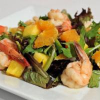 De Camarones Ensalada · Served with mixed greens, shrimp, orange, pineapple and mango dressing.