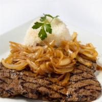 Bistec De Palomilla · Served with traditional thin Cuban steak and sauteed onions.