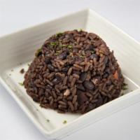 Congri · black beans mixed with white rice and bacon.