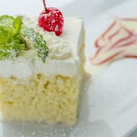 Tres Leches · Sponge cake soaked in tree milk.