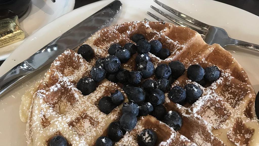 Belgian Waffles · Served with fresh fruits.