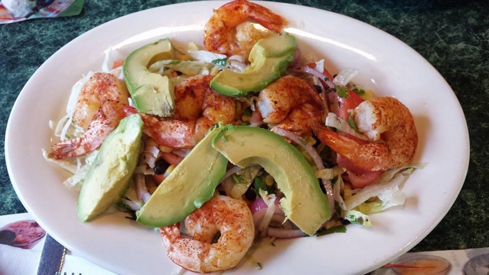 Tuscan Shrimp Salad · Tomato, fresh mozzarella cheese, red onions, kalamata olives, roasted red peppers, oregano, olive oil, and basil over romaine lettuce, spinach and arugula with grilled mini shrimp and balsamic vinaigrette.