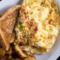 Western Omelet · Ham, Peppers & Onions with choice of Toast and Potatoes