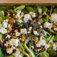 Mesclun Salad · Baby greens, cranberries, walnuts, crumbled Gorgonzola cheese & balsamic dressing