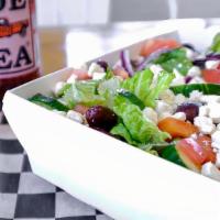 Greek Salad · Romaine lettuce, cucumbers, tomatoes, red onions, olives & feta cheese