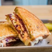 Grilled Reuben · Corned beef, Swiss cheese, coleslaw, Thousand Island dressing on grilled rye bread