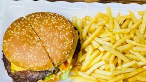 Cheese Burger Deluxe · Served with french fries and can of soda.