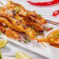 Satay (3 Pcs) · Choice of protein skewers marinated, satayed and served with a peanut dipping sauce and cucu...