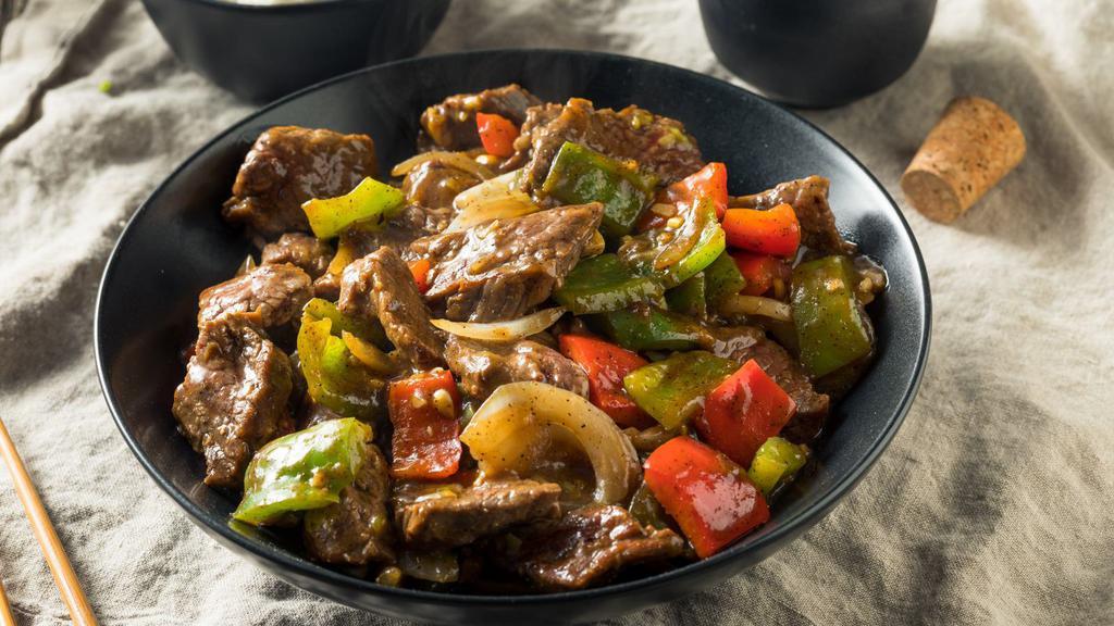 Pepper Steak With Onions A La Carte · Tender flavorful steak with sautéed onions.