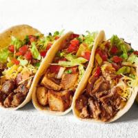Three Tacos · Want a relaxing activity? We suggest building your own tacos - soft or crunchy tortillas fol...