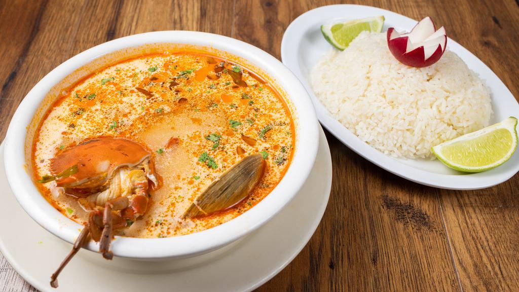 Sopa De Mariscos · Shrimp, clam and crab soup. Served with rice and tortilla.