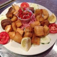 Yuca Frita O Hervida Con Chichicarron · Fried or boiled cassava served with fried chunk pork meat.