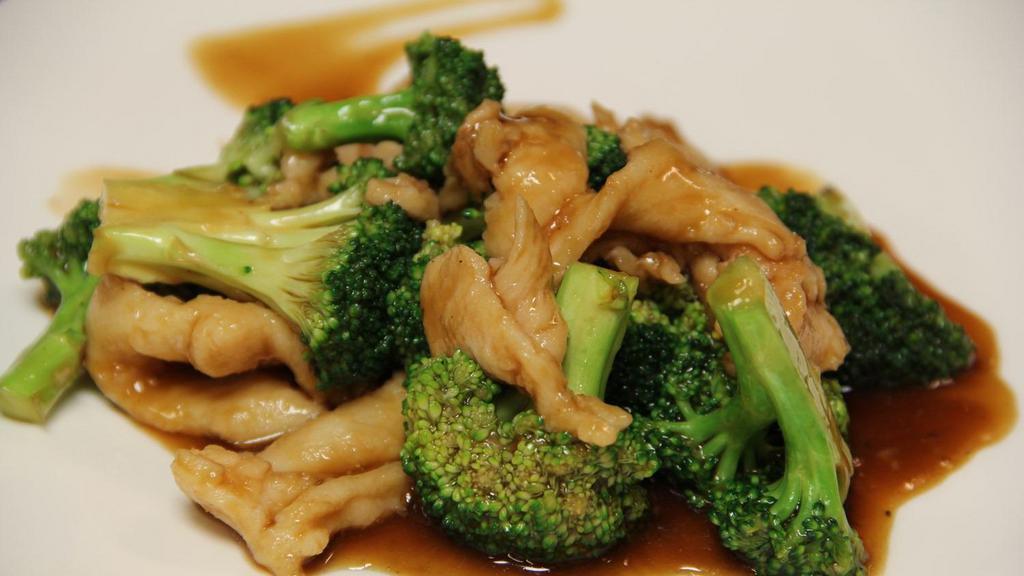 Chicken With Broccoli · Served with small white rice.
