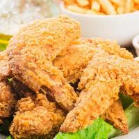 Fried Chicken Wings · Four pieces.