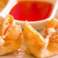 Crab Rangoon · 8 pieces. Wonton with cream cheese & sweet & sour sauce on the side.