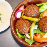 Falafel Mazza · Vegetable patties. Chickpea and fava bean mixed with herbs and exotic spices fried golden br...