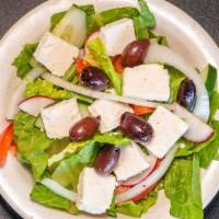 Mediterranean Salad · Crisp lettuce, onions, freshly cut tomatoes, feta, black olives, radishes, parsley and mint ...