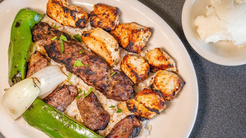 Kabob Combination · Choice of any three skewers. Served with pita breads, hummus, rice pilaf and house salad with homemade Byblos dressing.