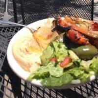 Veggie Kabob · Two skewers. Mixed vegetables grilled to perfection. Served with pita breads, hummus, rice p...