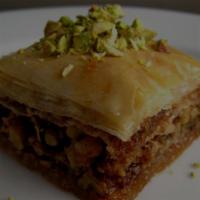 Walnut Baklava · Baklava, from the Farsi for many leaves, is a pastry perfected by royal bakers, consisting o...