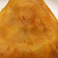 Chicken Samosa · Most popular. Two pieces of deep fried patties stuffed with chicken keema, onions, and spices.
