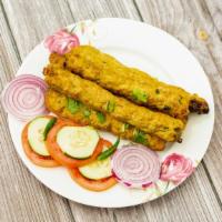 Chicken Seekh Kabab (02 Pcs) · Two pieces of ground chicken seasoned with herbs, cooked in a tandoori oven. Served with one...