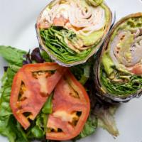 #30. Power Protein Wrap · On a large tortilla, we spread guacamole, roasted turkey, sliced tomatoes, baby spinach, fet...