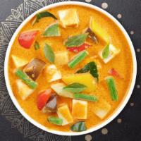 Gang Kuar Goong Dinner · Shrimp, pineapple, onion, tomato, bell pepper, and basil with red curry paste. Served with r...