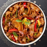 Drunken Master Noodles · Stir-fried flat noodles with onions, bell peppers, tomato, and basil in our spicy chili sauce.