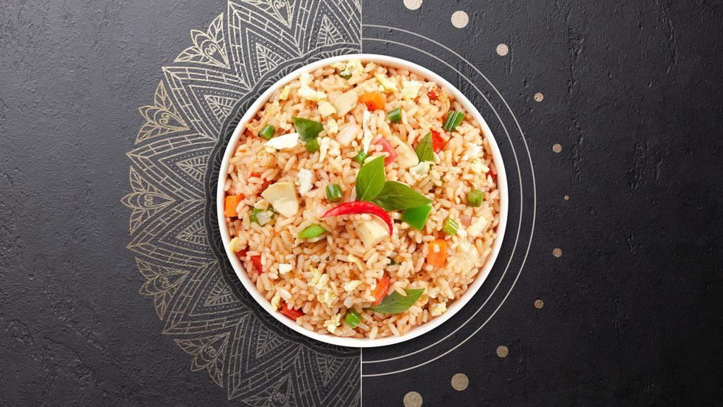 All About That Basil Fried Rice · Fried rice with egg, fresh chili, onions, bell peppers, tomato, and basil.