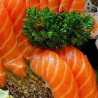 Salmon Lover · Four pieces sushi, four pieces sashimi, salmon roll.