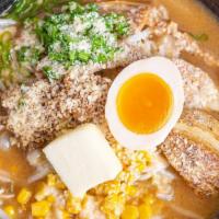 Powdered Snow Ramen · Red miso broth with Parmesan and butter topped with ground pork, bean sprouts, cabbage, scal...